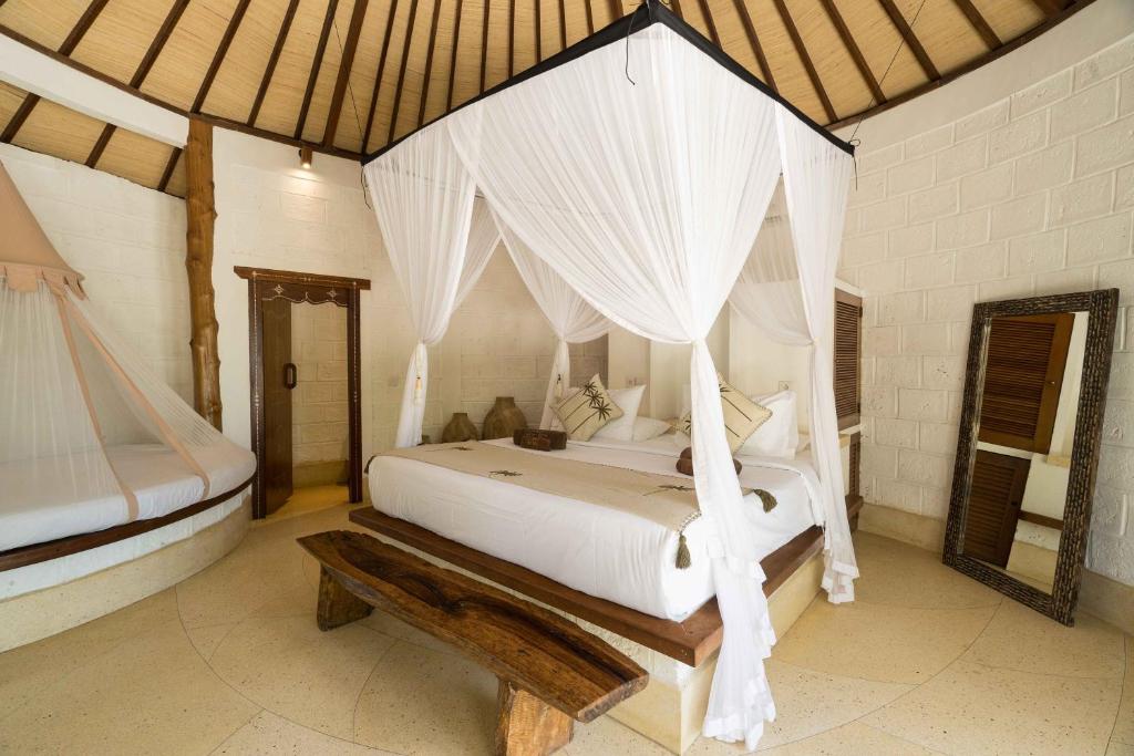 Postel nebo postele na pokoji v ubytování Biu Biu Resort Bali