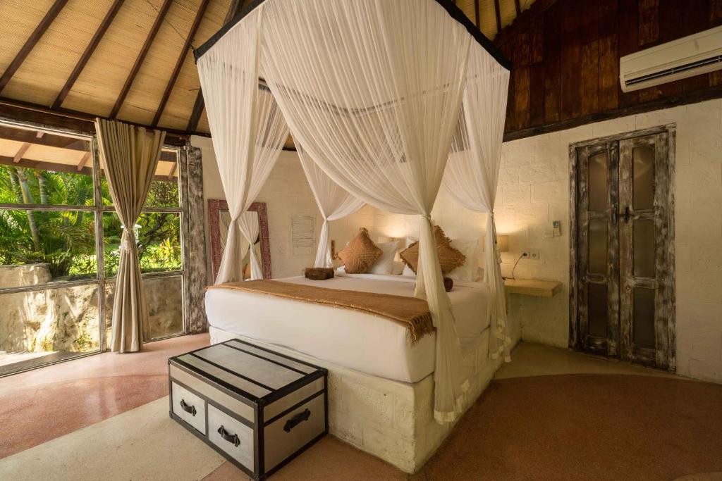 Postel nebo postele na pokoji v ubytování Biu Biu Resort Bali