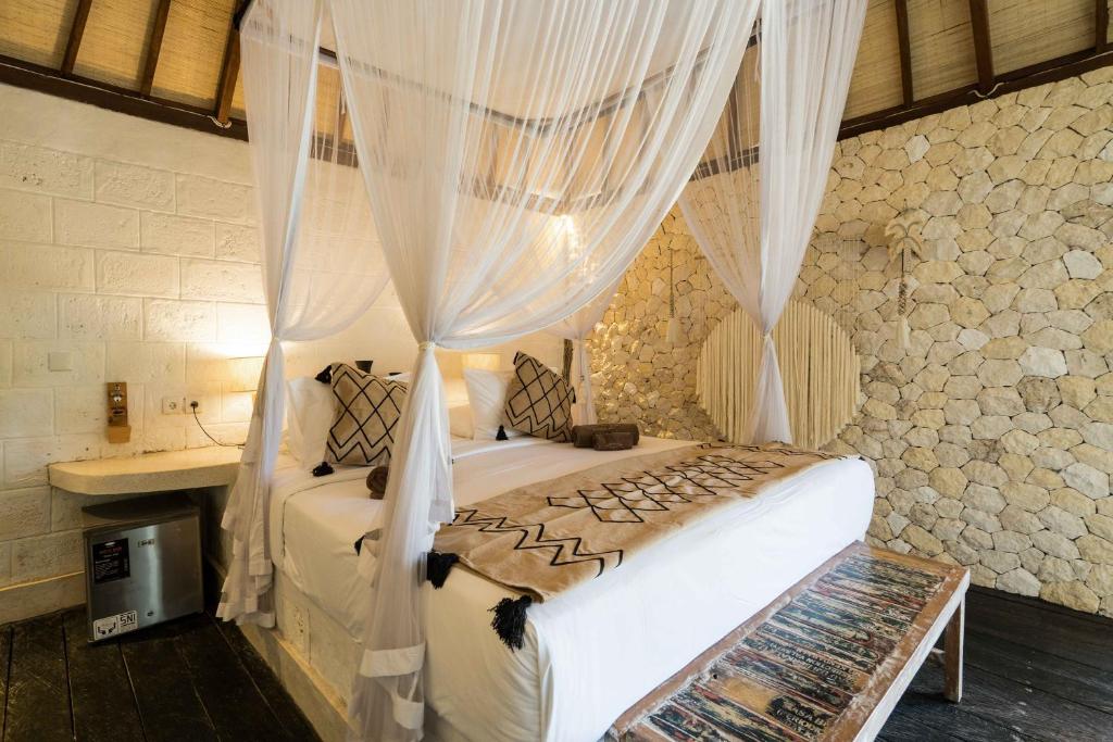 Postel nebo postele na pokoji v ubytování Biu Biu Resort Bali