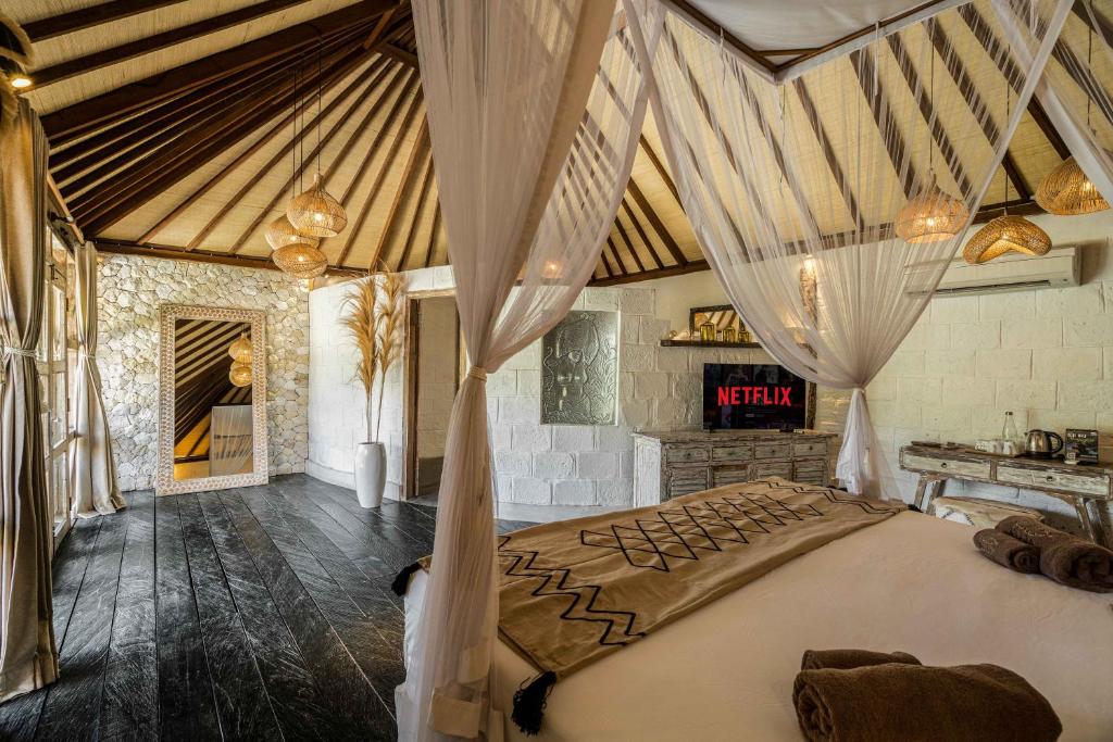 Postel nebo postele na pokoji v ubytování Biu Biu Resort Bali
