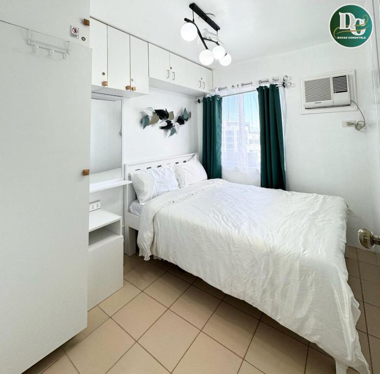 Postel nebo postele na pokoji v ubytování COZYTEL Centro