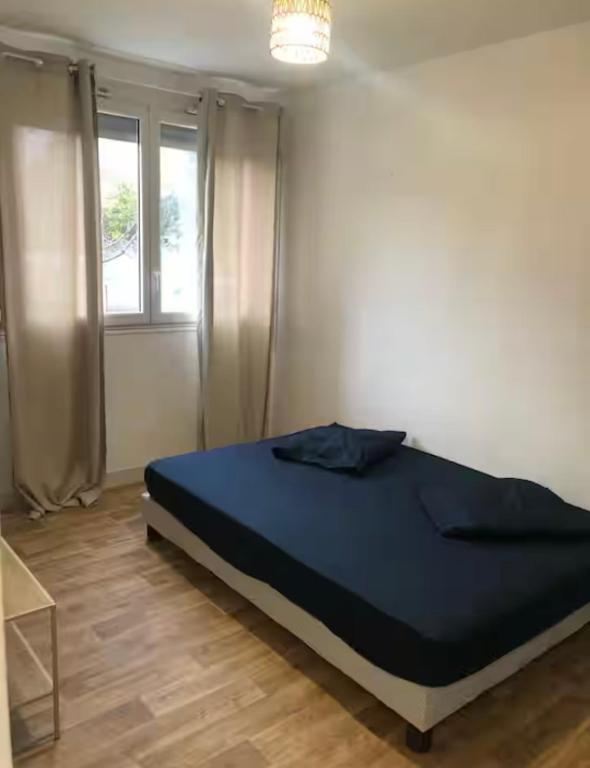 Posteľ alebo postele v izbe v ubytovaní Appartement Bron