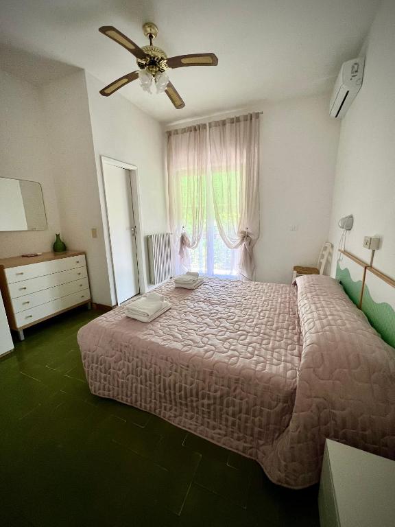 Postel nebo postele na pokoji v ubytování Bed&Breakfast Villa Lorena