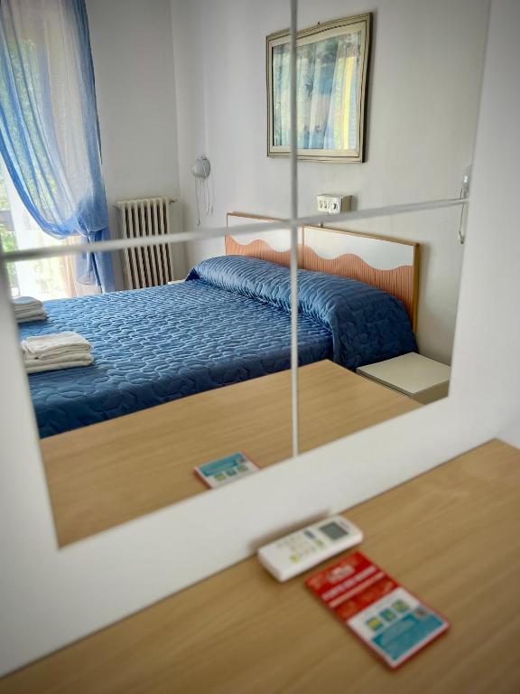 Postel nebo postele na pokoji v ubytování Bed&Breakfast Villa Lorena