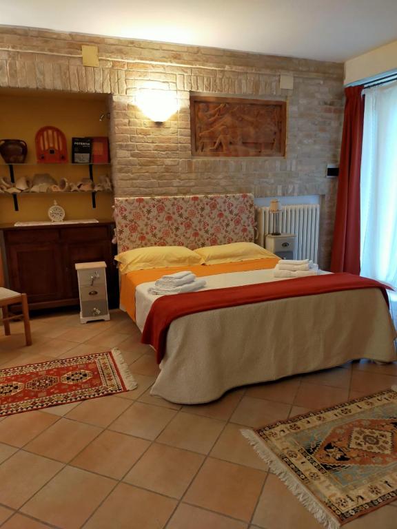 Postel nebo postele na pokoji v ubytování A Casa Di Pici