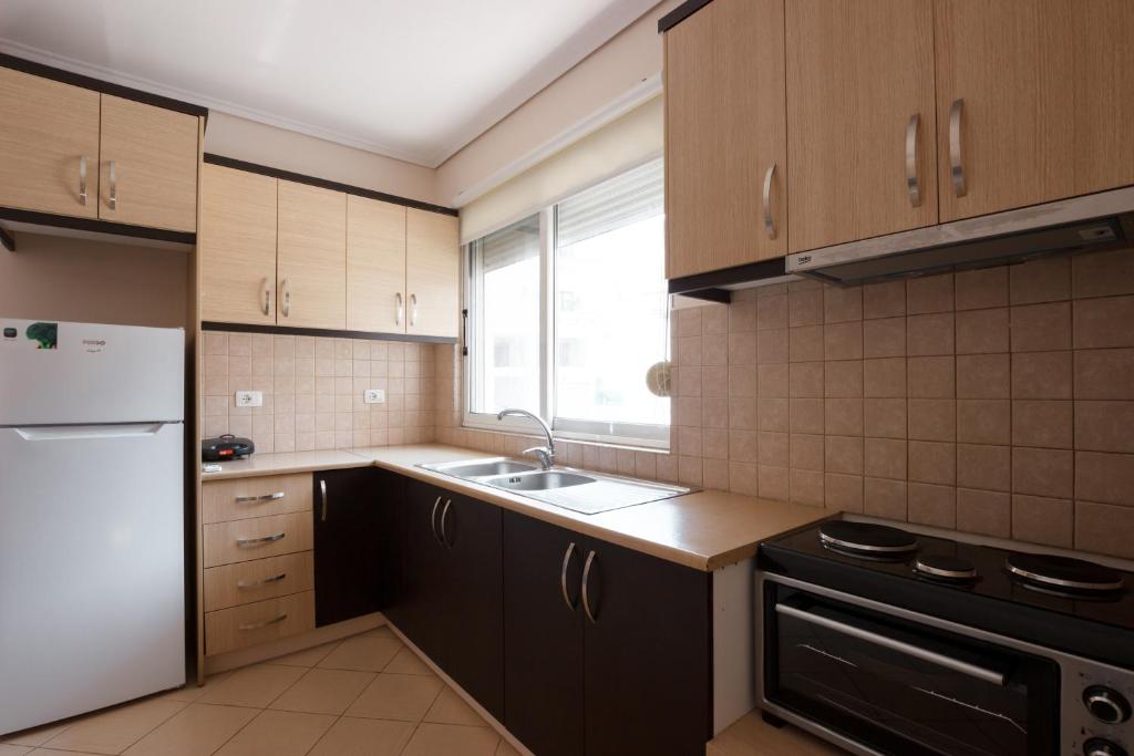 Kuchyň nebo kuchyňský kout v ubytování Ariadne 7 Apartments