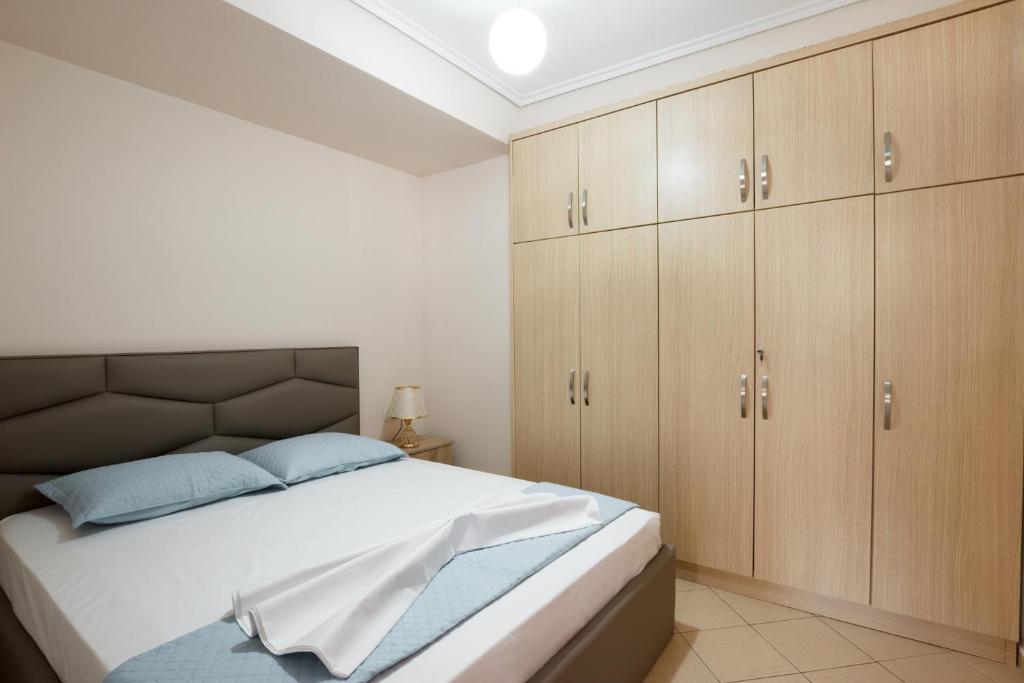 Postel nebo postele na pokoji v ubytování Ariadne 7 Apartments