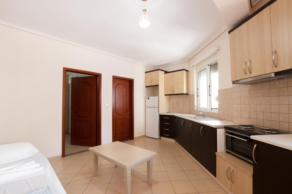 Kuchyň nebo kuchyňský kout v ubytování Ariadne 7 Apartments