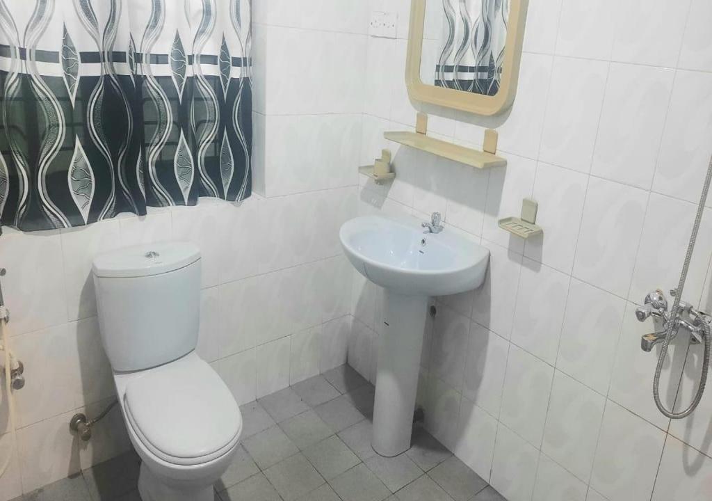 Koupelna v ubytování Golden Shower Inn