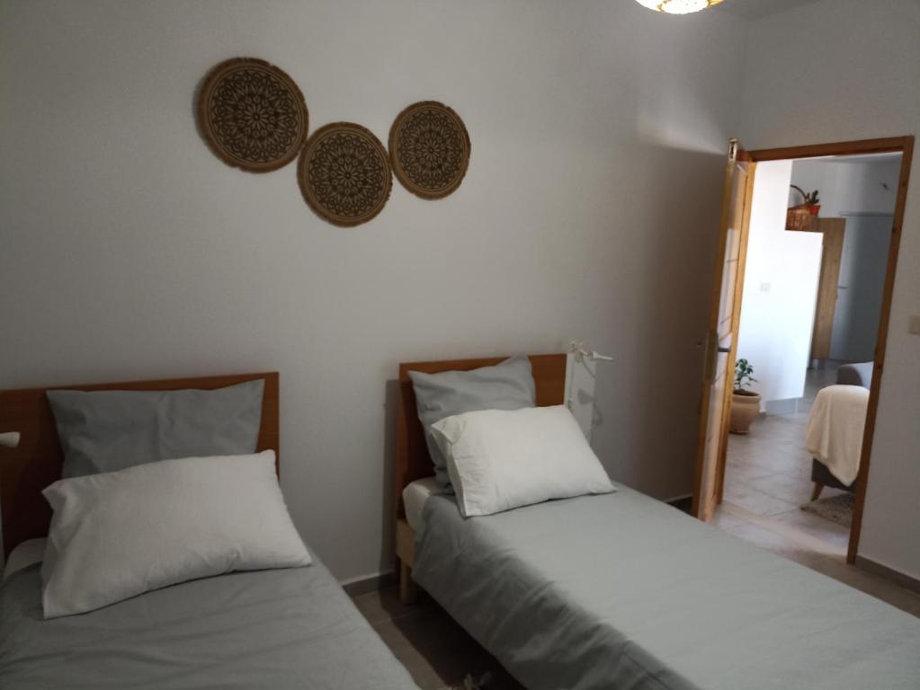 Postel nebo postele na pokoji v ubytování Le cocon