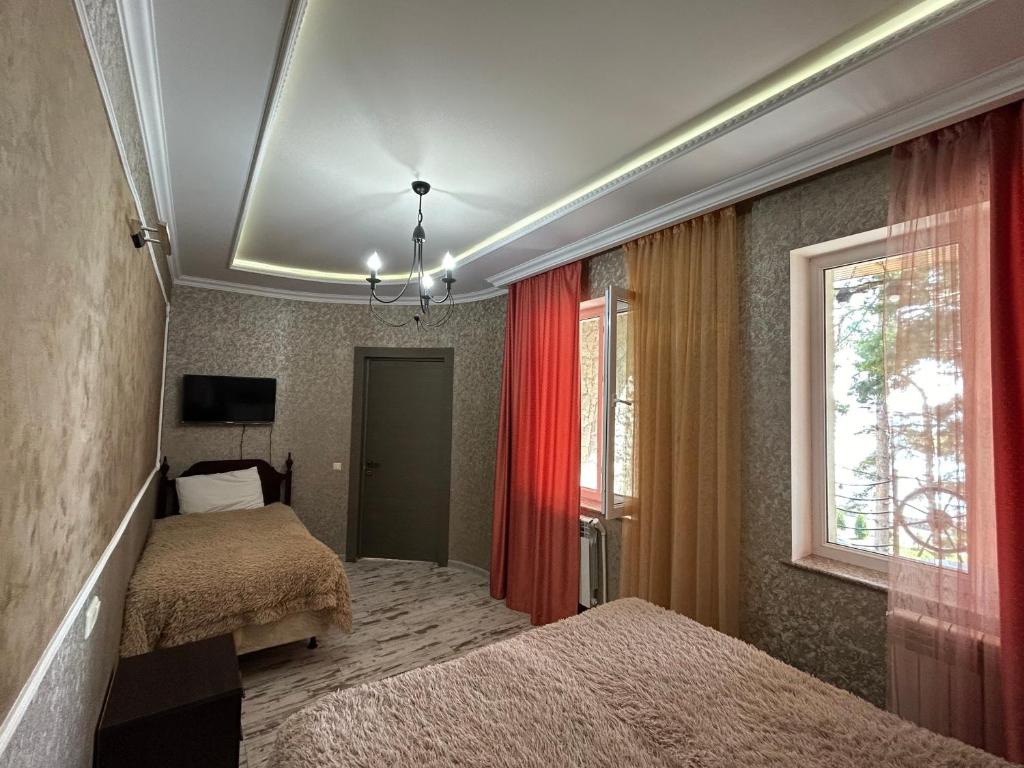 Postel nebo postele na pokoji v ubytování Чичхани, Chichkhani, Չիչխանի
