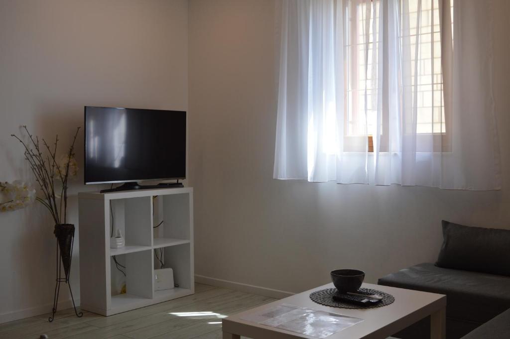 TV a/nebo společenská místnost v ubytování Apartments Lea