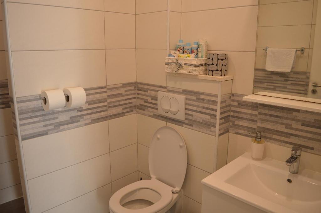 Koupelna v ubytování Apartments Lea