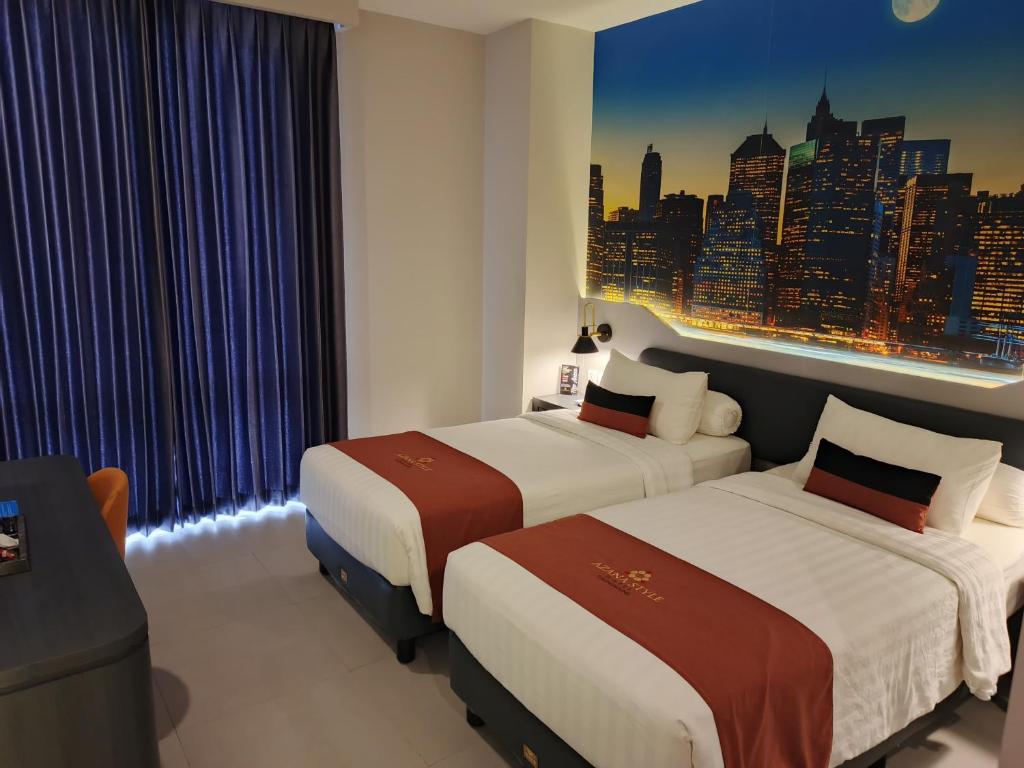 Postel nebo postele na pokoji v ubytování Azana Style Hotel Tulungagung