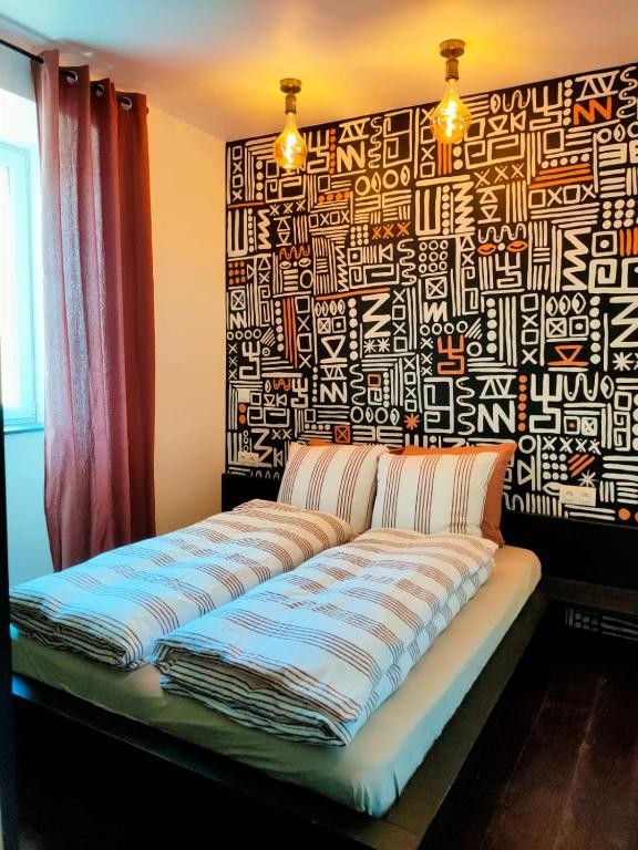 Postel nebo postele na pokoji v ubytování Moulin A