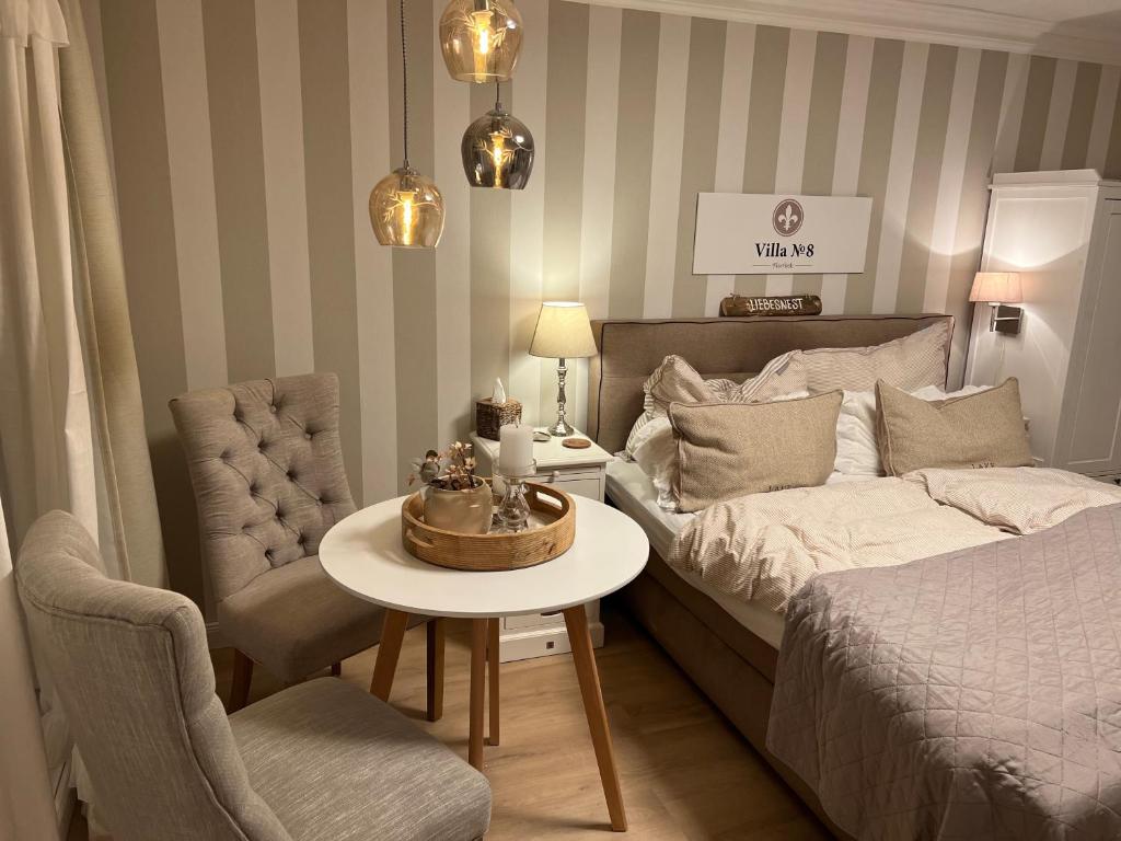 Ένα ή περισσότερα κρεβάτια σε δωμάτιο στο Villa No 8 Stilvolles 2 Personen Apartment mit separatem Eingang mit direkter Zuganbindung