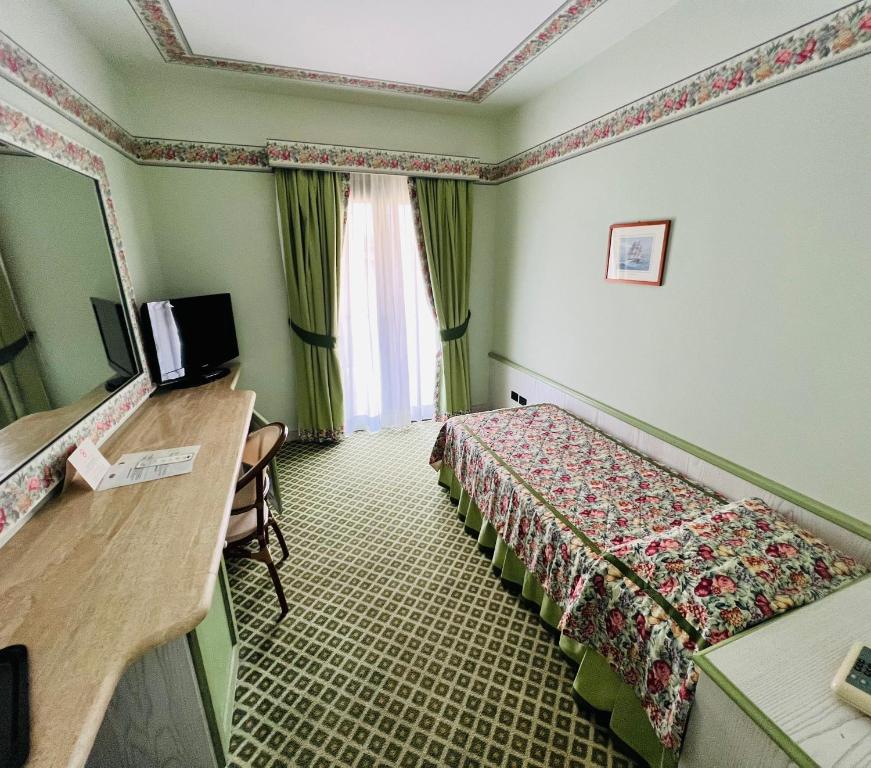 TV a/nebo společenská místnost v ubytování Hotel Relais I Presidi