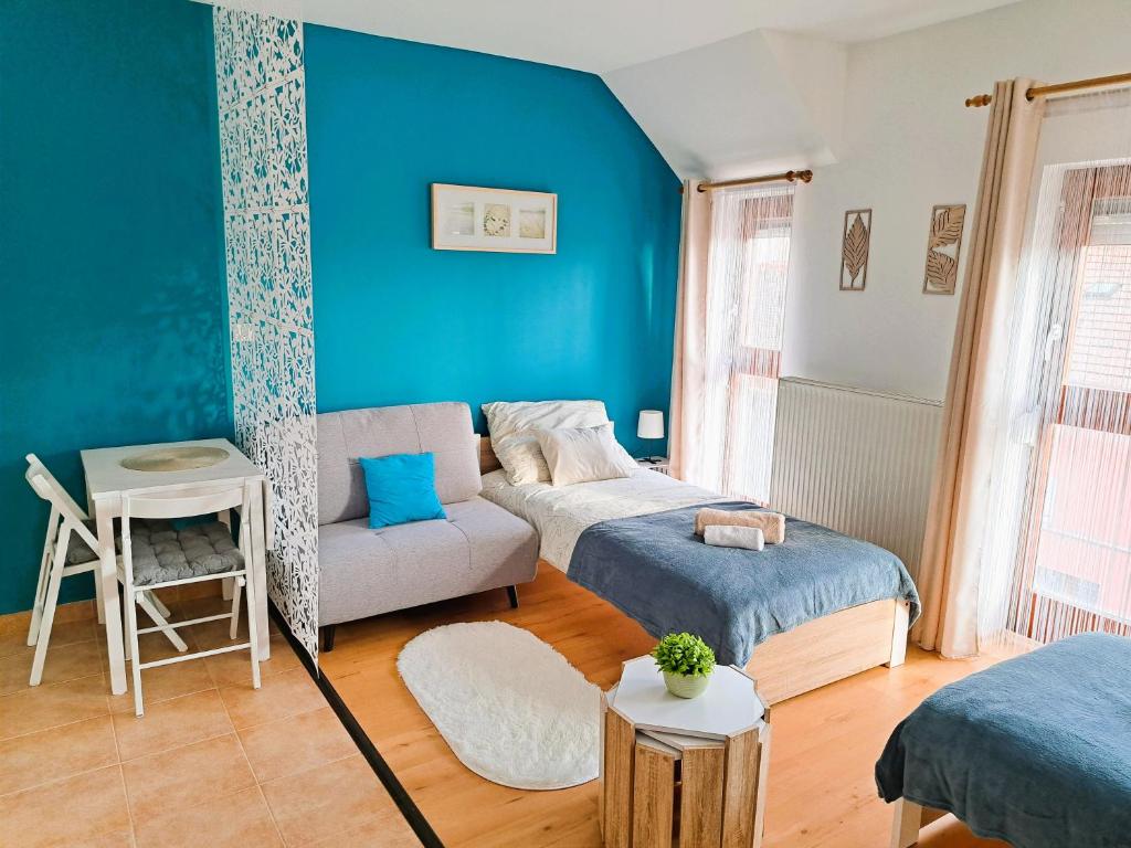 Postel nebo postele na pokoji v ubytování Mini Apartman