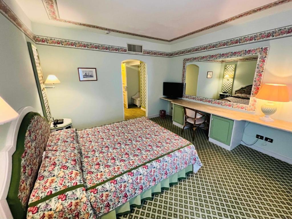 Postel nebo postele na pokoji v ubytování Hotel Relais I Presidi