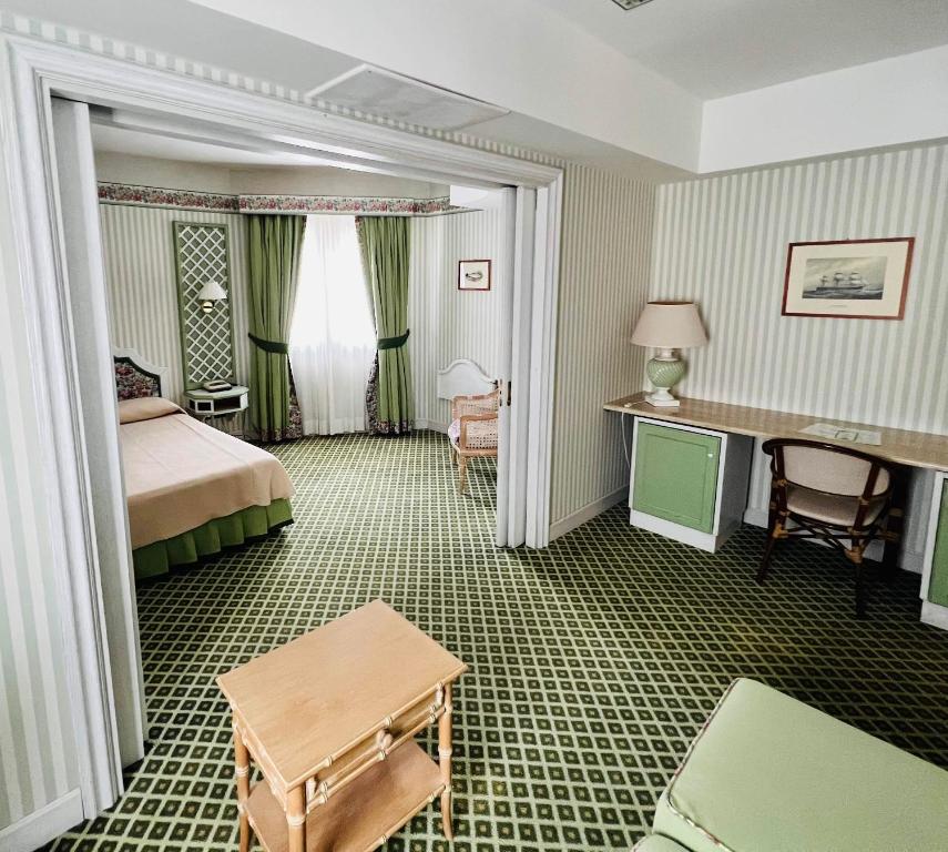 Postel nebo postele na pokoji v ubytování Hotel Relais I Presidi