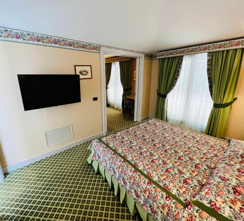 TV a/nebo společenská místnost v ubytování Hotel Relais I Presidi