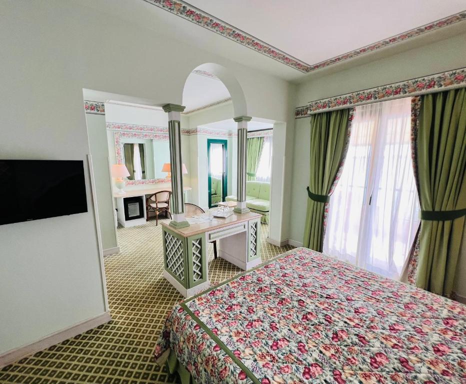 Postel nebo postele na pokoji v ubytování Hotel Relais I Presidi
