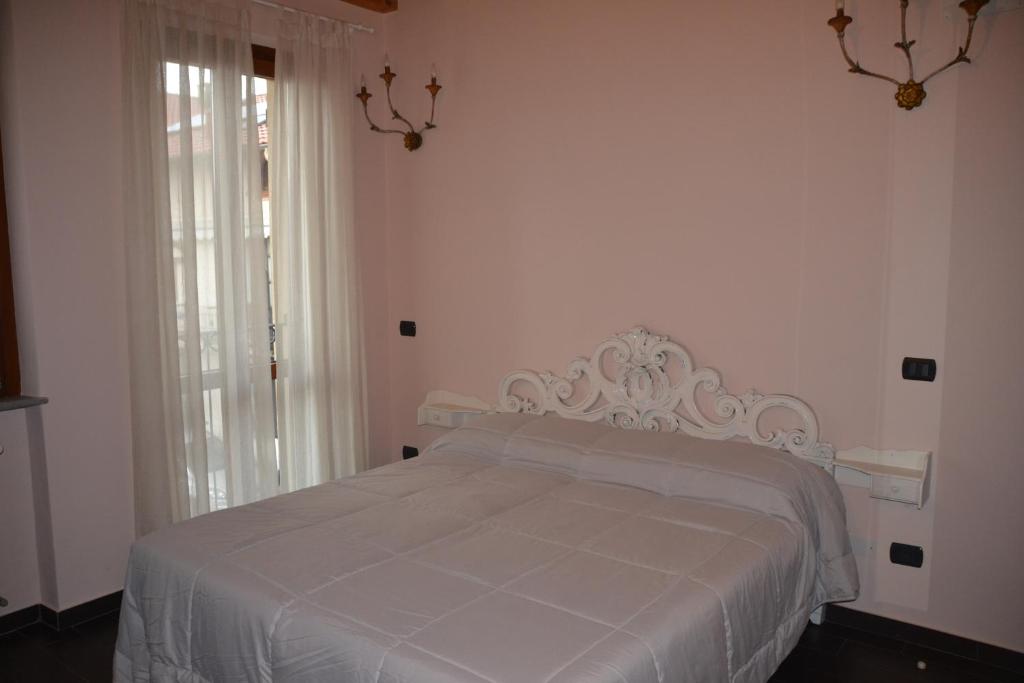 Postel nebo postele na pokoji v ubytování B&B Il Rustico