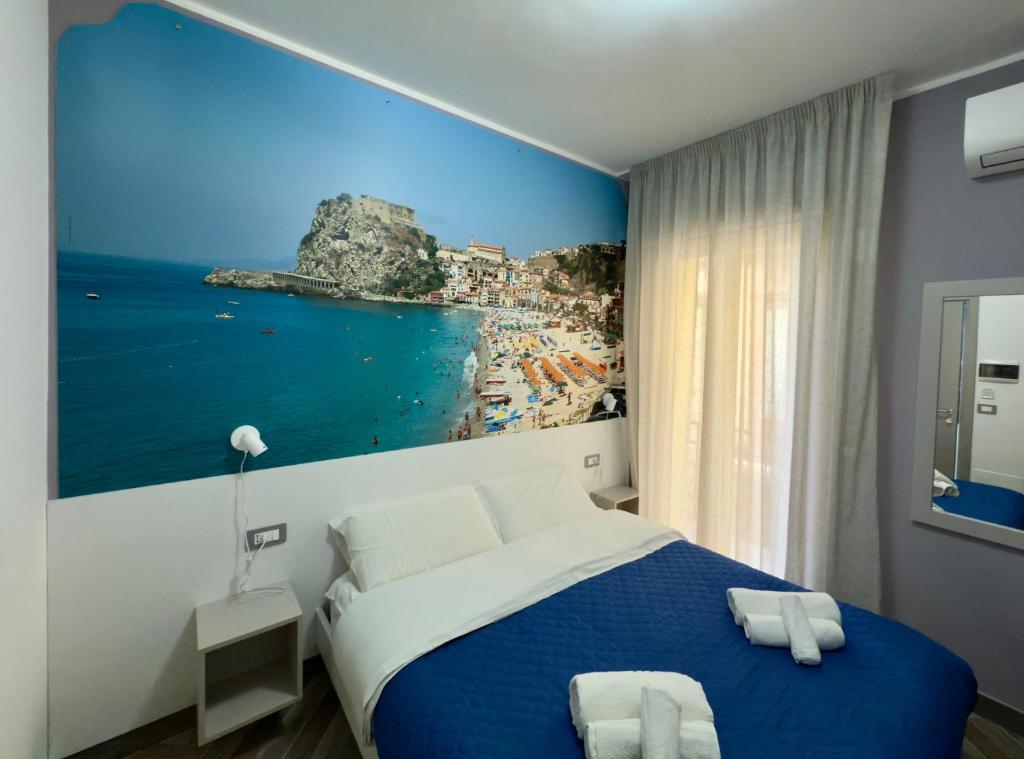 Postel nebo postele na pokoji v ubytování Leonardo Suites Scilla