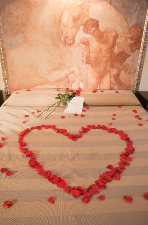 Postel nebo postele na pokoji v ubytování Albergo Sant'Emidio