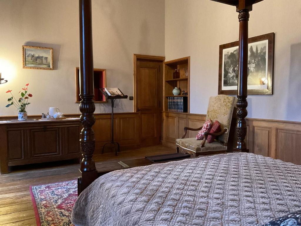 Postel nebo postele na pokoji v ubytování Le Logis d'Equilly
