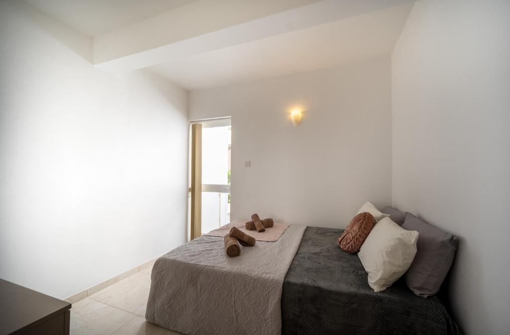 Postel nebo postele na pokoji v ubytování Seaview Rooftop, 3 bed, 2 bath