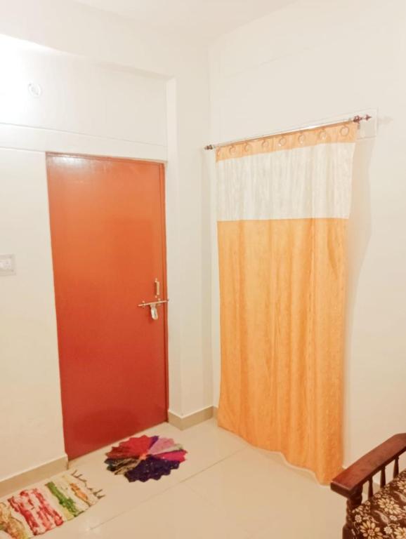 Postel nebo postele na pokoji v ubytování Mamta Home Stay