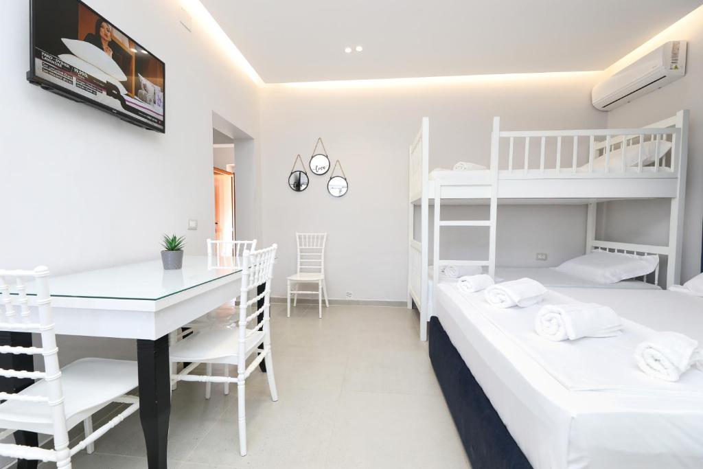 Postel nebo postele na pokoji v ubytování Vila Feliz - Premium Rooms with Free Private Parking