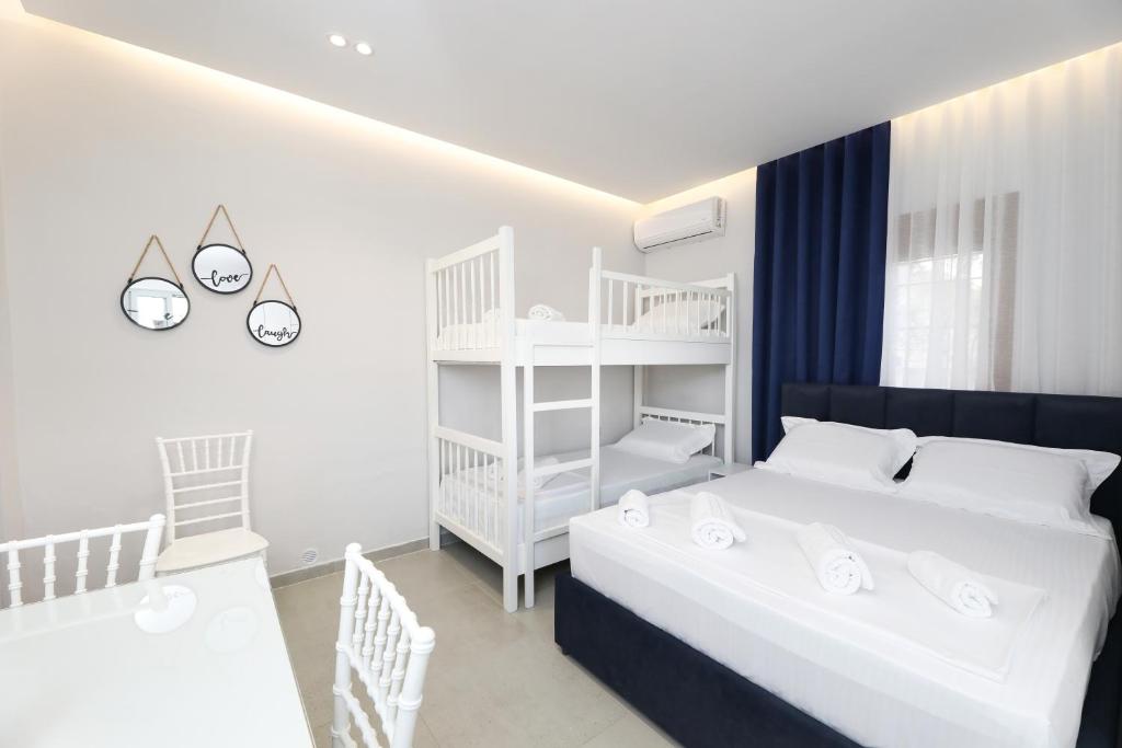 Postel nebo postele na pokoji v ubytování Vila Feliz - Premium Rooms with Free Private Parking