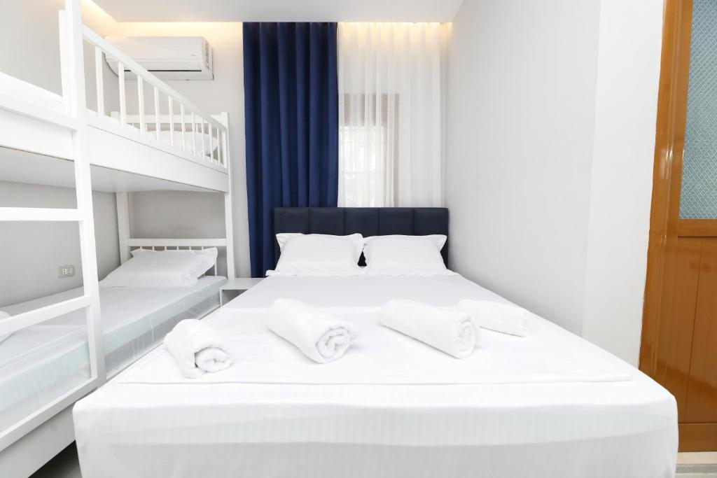 Postel nebo postele na pokoji v ubytování Vila Feliz - Premium Rooms with Free Private Parking