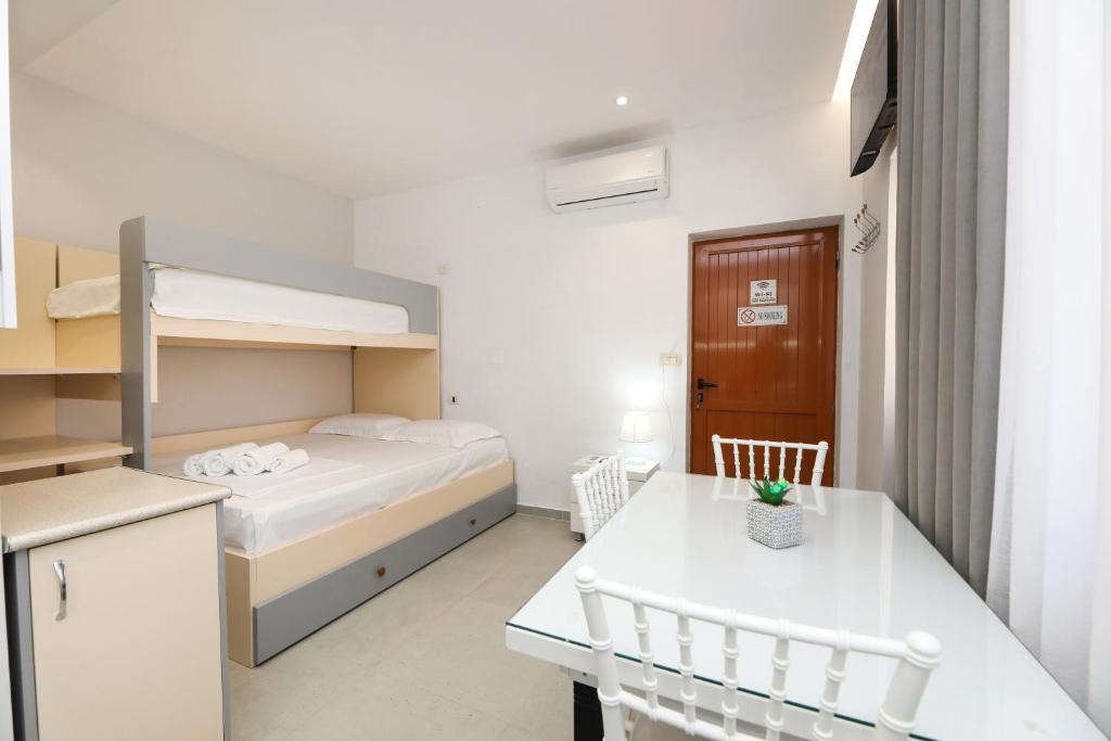 Postel nebo postele na pokoji v ubytování Vila Feliz - Premium Rooms with Free Private Parking