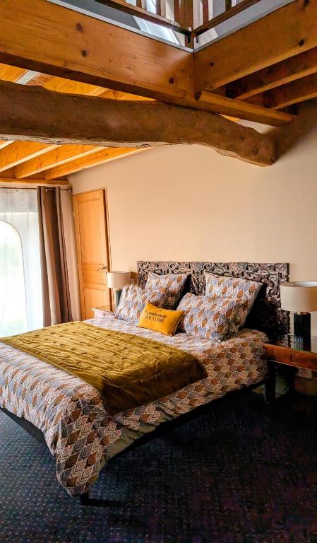 Postel nebo postele na pokoji v ubytování Le Clos Hortense
