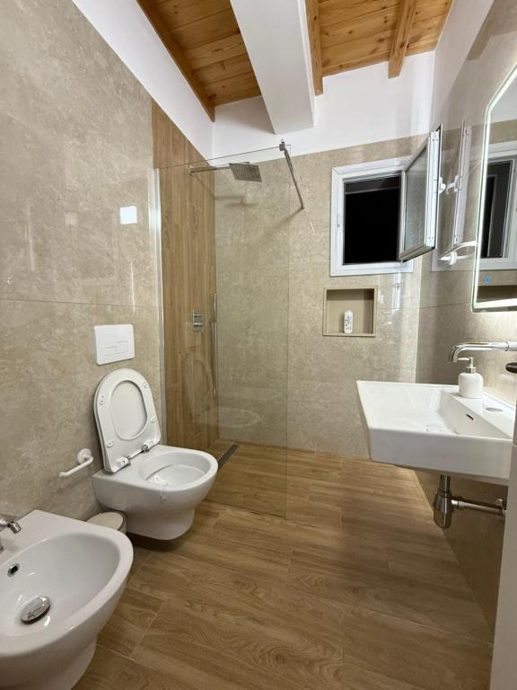 Koupelna v ubytování Maison Apartments