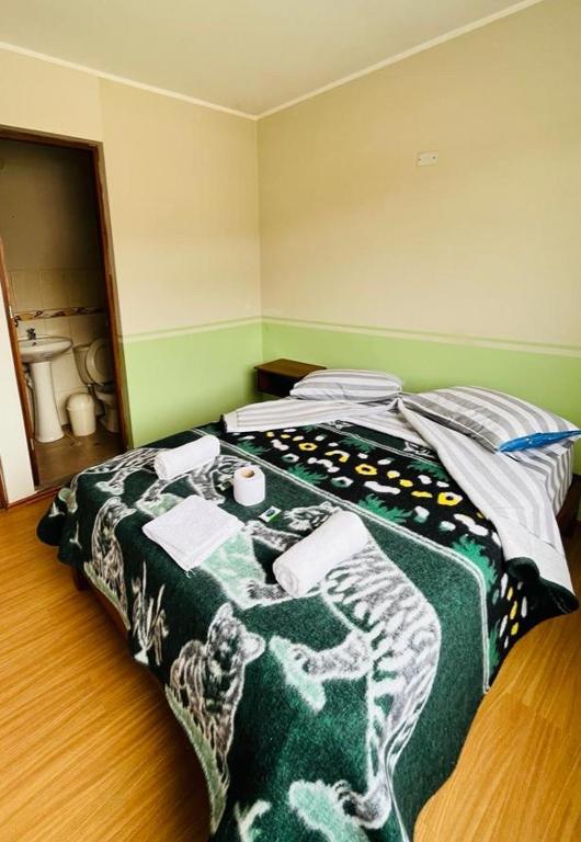 Postel nebo postele na pokoji v ubytování Montañero Hostel