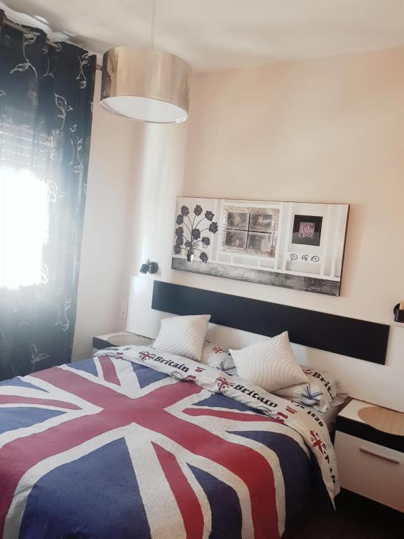 Postel nebo postele na pokoji v ubytování Red Apartamento