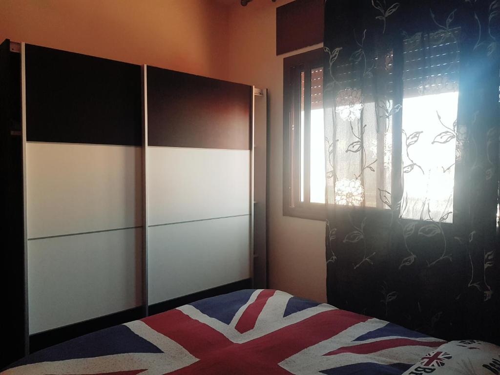 Postel nebo postele na pokoji v ubytování Red Apartamento