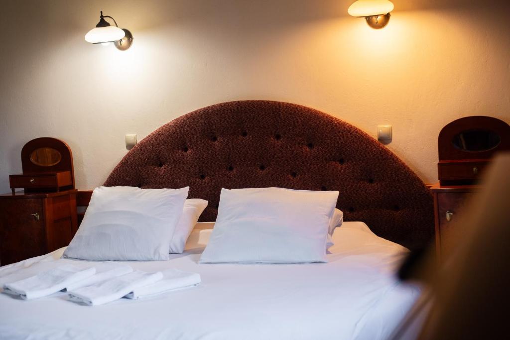 Posteľ alebo postele v izbe v ubytovaní Hotel Restauracja Jaś Wędrowniczek