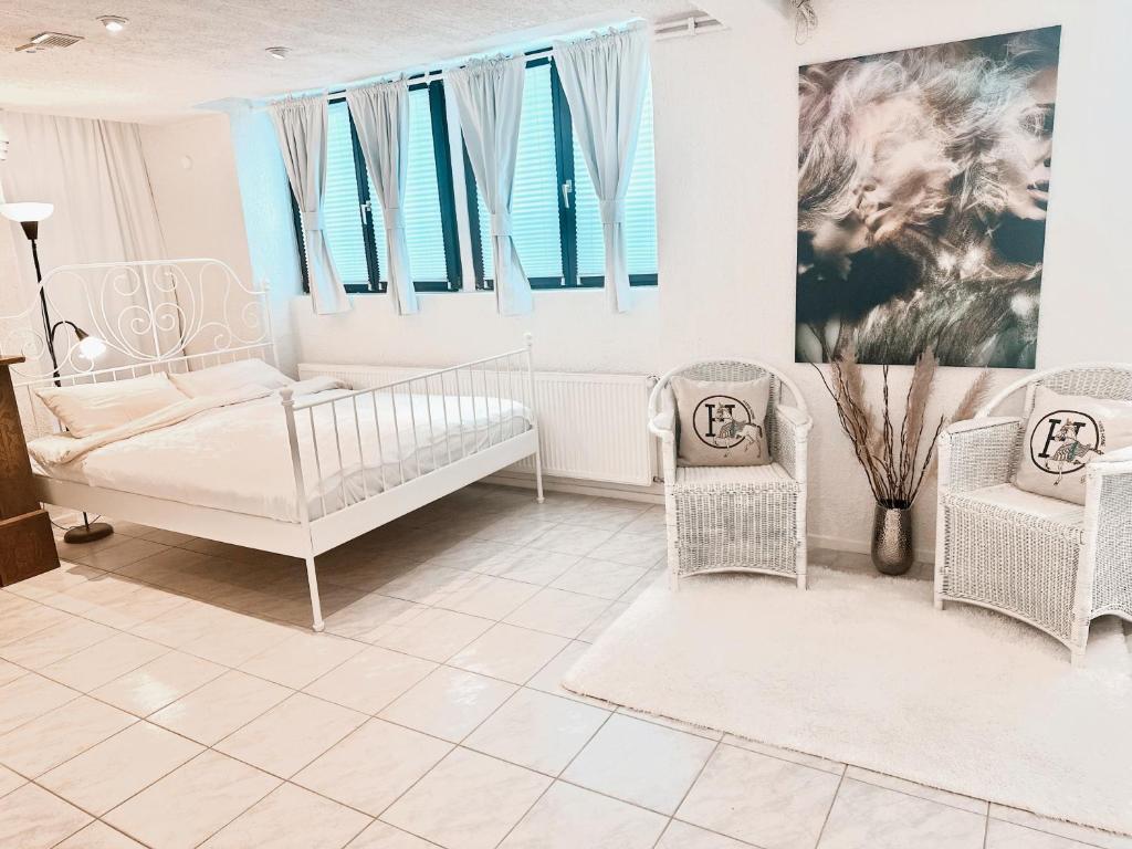 Postel nebo postele na pokoji v ubytování Studio am Waldbach