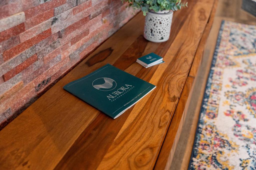 a book sitting on top of a wooden table at Aurora Schaar 3 in Wilhelmshaven