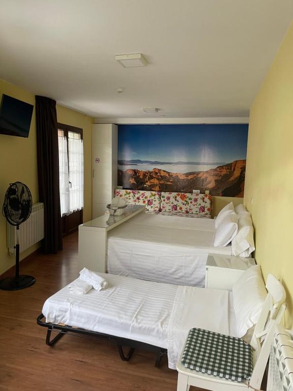 Postel nebo postele na pokoji v ubytování The Way Hotel Molinaseca