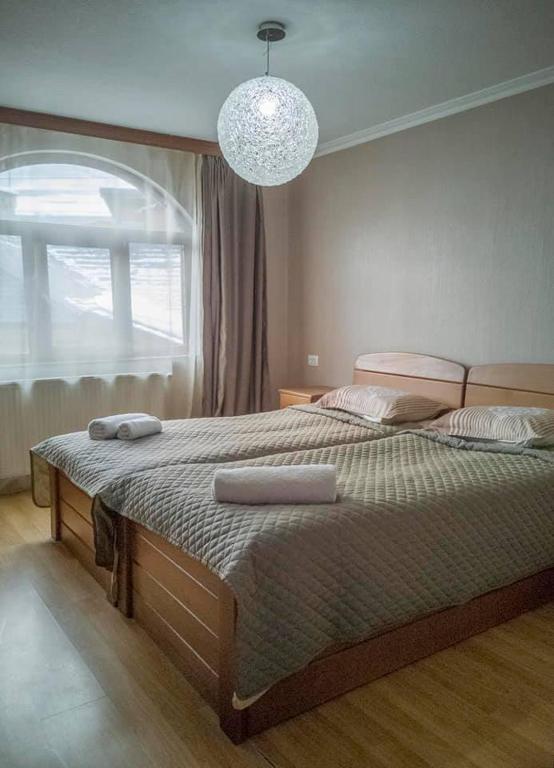 Letto o letti in una camera di Ushba House