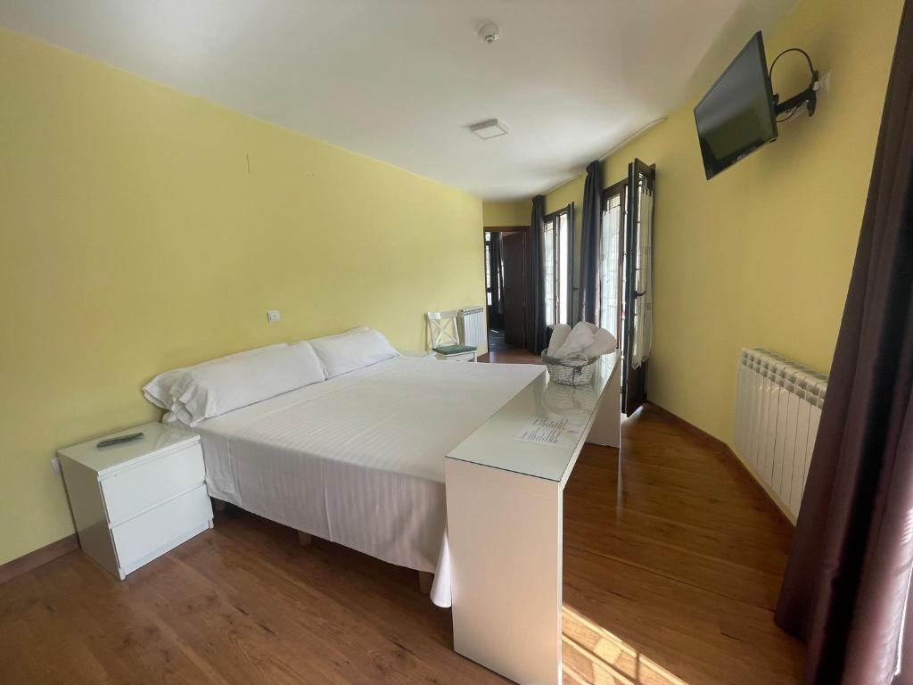 TV a/nebo společenská místnost v ubytování The Way Hotel Molinaseca