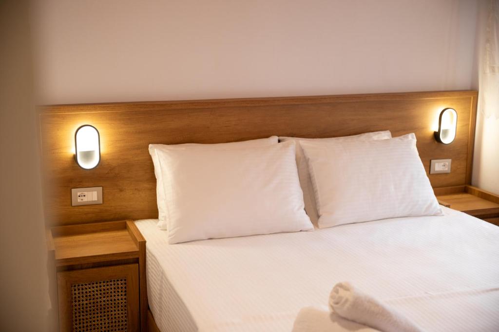 Postel nebo postele na pokoji v ubytování Guesthouse Lani