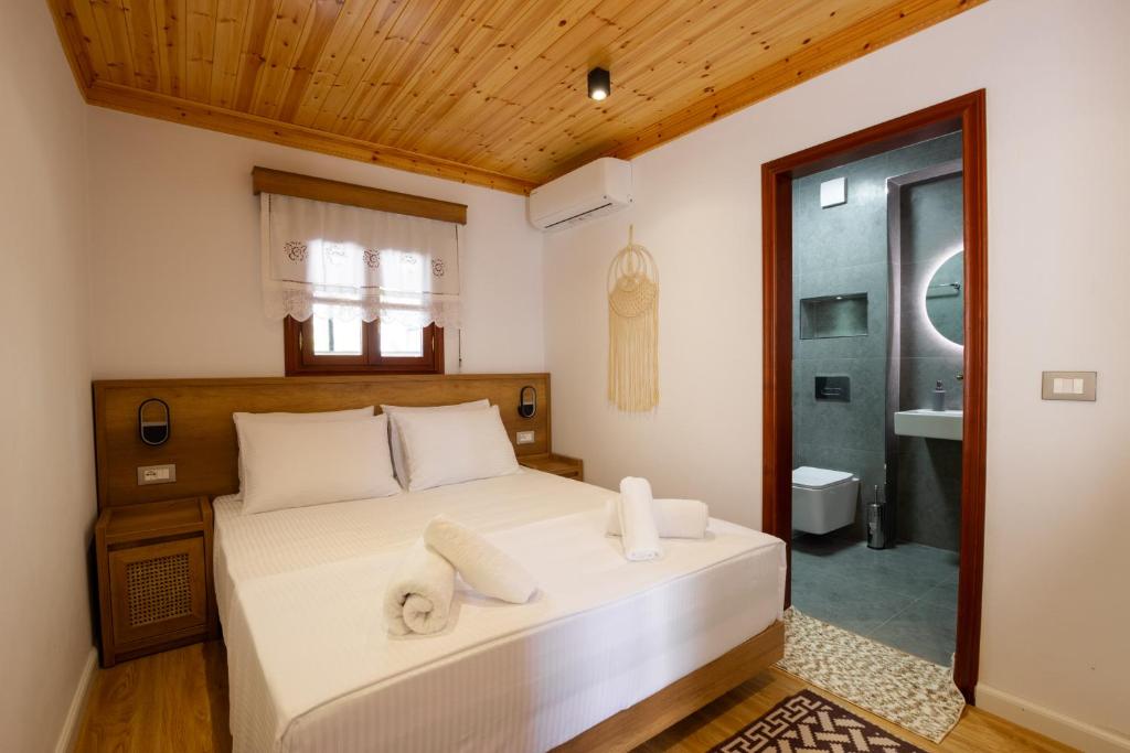Postel nebo postele na pokoji v ubytování Guesthouse Lani