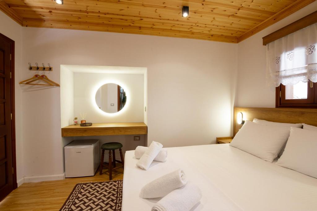 Postel nebo postele na pokoji v ubytování Guesthouse Lani